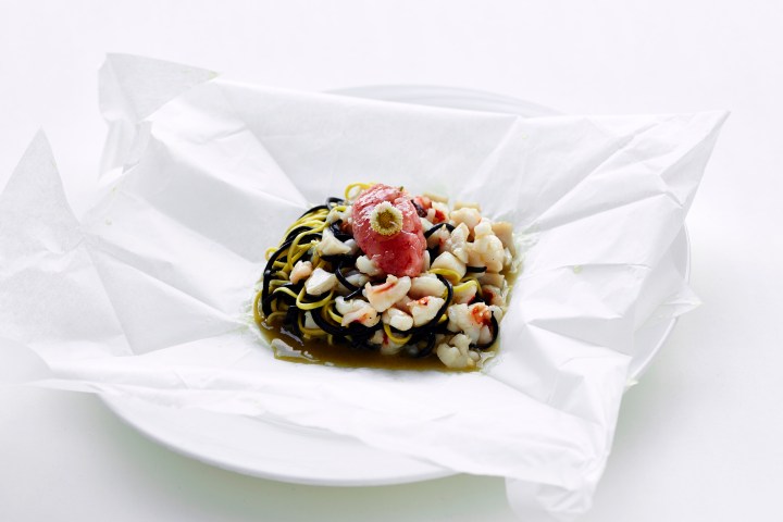 Home-made black and white tagliolini with scallops, king prawns and red shrimp served in an origami parchment box. The dishes entices the moment it hits the table with its uber cute presentation (see next photo) and seduces you when you open the box withs its seafood aroma. Perfectly cooked pasta and the combination of raw and cooked seafood inspired - a standout dish. 