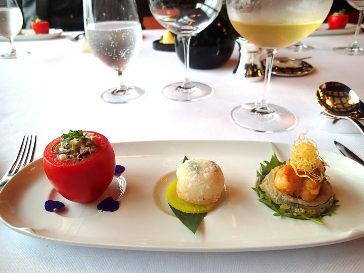 Crab salad, crispy scallop, pan fried lobster A dish from chef Tak. Interestingly the menu creation began with Tak coming up with his dishes and then the two French chefs created dishes which they felt combined into a harmonious menu. The crab salad (crab, mushrooms, bamboo shoot) was delicious, although the somewhat mealy tomato it was served in detracted from the dish — perhaps it was meant as a serving vessel only. The divine deep-fried scallop with pear is a signature dim sum item and it deserves high praise. Every time I have eaten this it has been excellent. The spiny lobster served with eggplant was another success, the two key ingredients a perfect pairing.